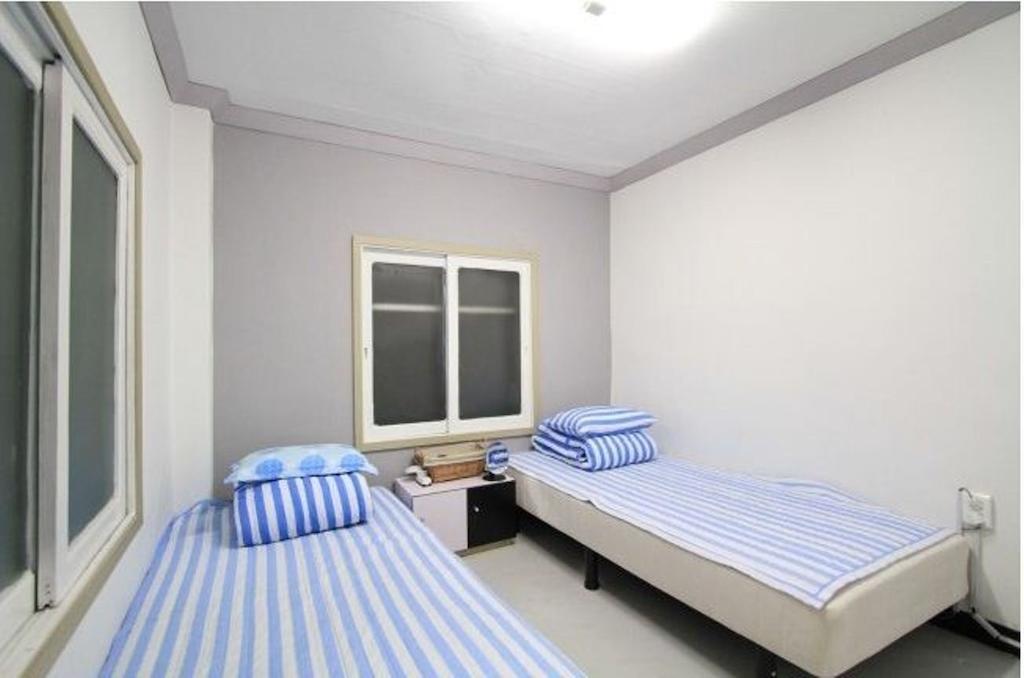 Yusun Guesthouse Ciudad Metropolitana de Ciudad Metropolitana de Busan Habitación foto